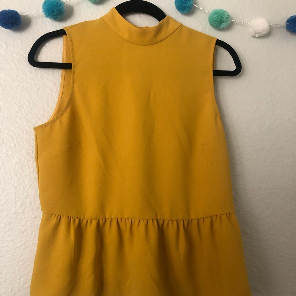 Yellow J.Crew Mock Neck Peplum Top